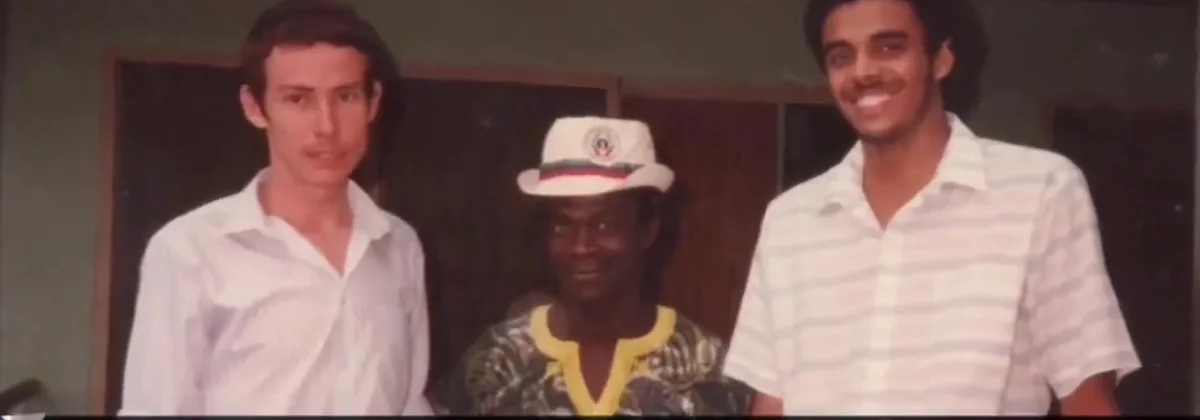 Medical students Stanley Jones and Dag Heward-Mills with a local man in a cap, Suhum, Ghana, 1988