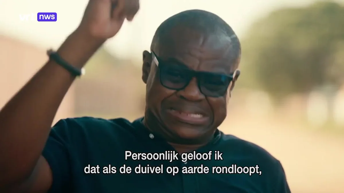 VRT’s subtitle over Lawrence Odonkor: “Personally, I believe that if the devil walks the earth…”. The film does not say he is suing the church.
